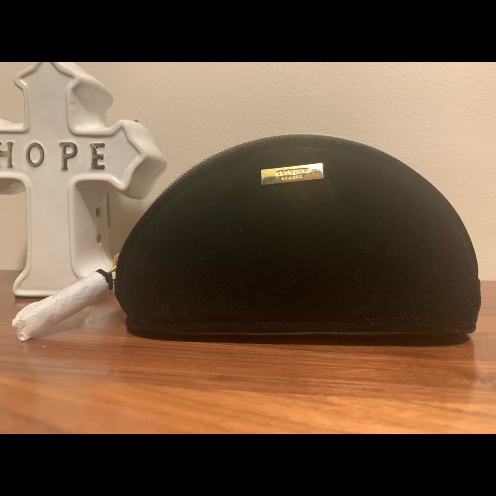 Cle De peau beauty small black cosmetic bag